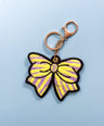 Purple + Yellow Striped Bow Bag Charm